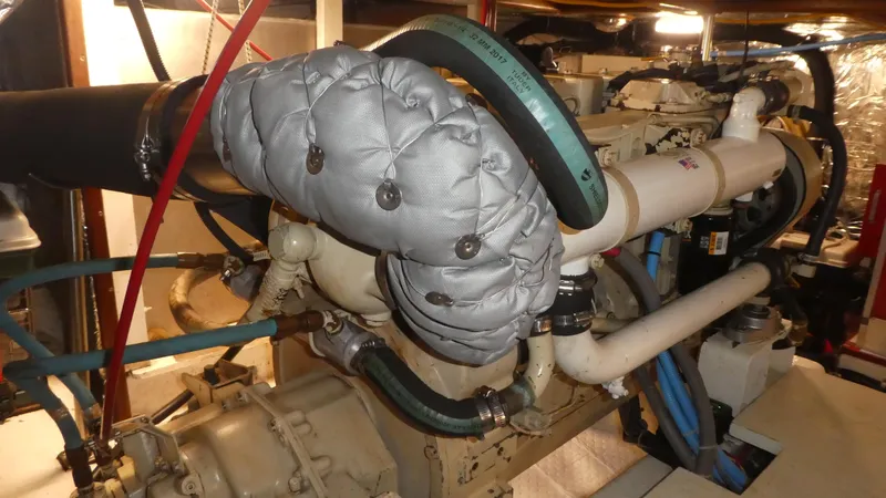 Slide: The Image of Engine room of 1992 Ocean Alexander 456 Classicco yacht, featuring insulated components. - 46