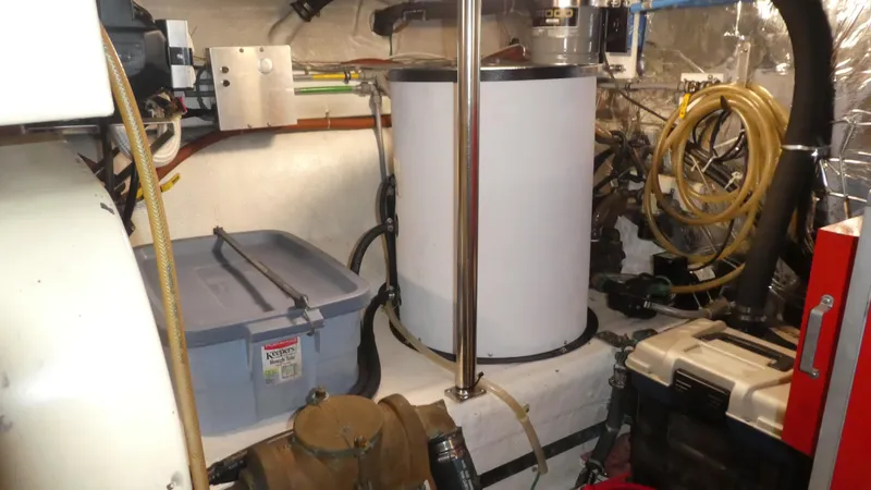 Slide: The Image of Engine room of 1992 Ocean Alexander 456 Classicco with equipment and storage. - 47