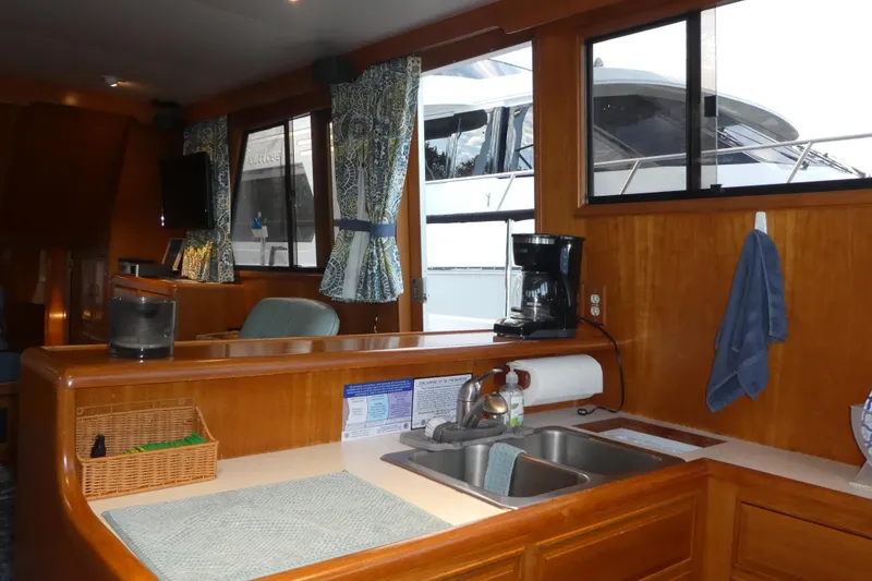 Slide: The Image of Interior of 1992 Ocean Alexander 456 Classicco yacht with kitchen and window view. - 7