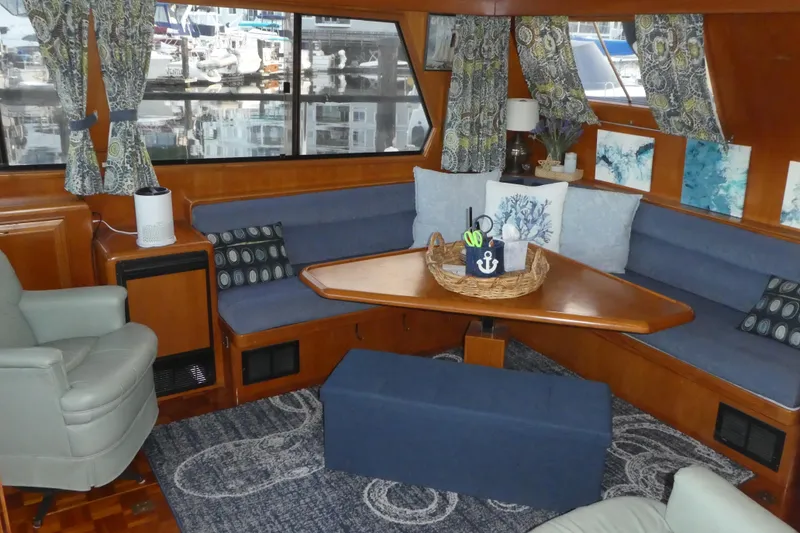 Slide: The Image of Interior of 1992 Ocean Alexander 456 Classicco yacht with cozy seating and nautical decor. - 9