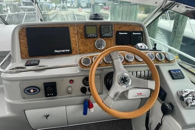 Slide: The Image of Helm of 2006 Formula 40 Performance Cruiser with Raymarine electronics and wooden steering wheel. - 10