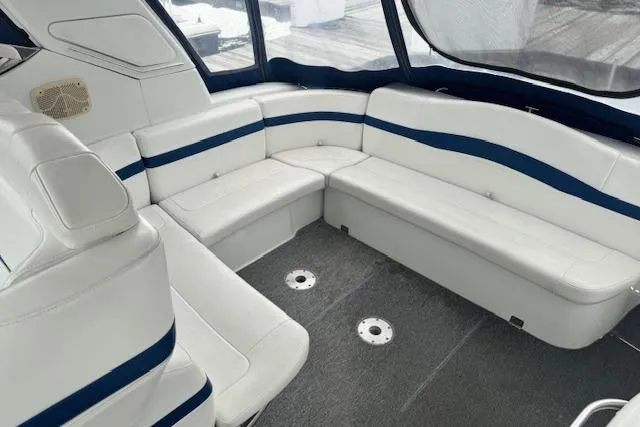 Slide: The Image of 2006 Formula 40 Performance Cruiser interior with white and blue seating, spacious and elegant design. - 6