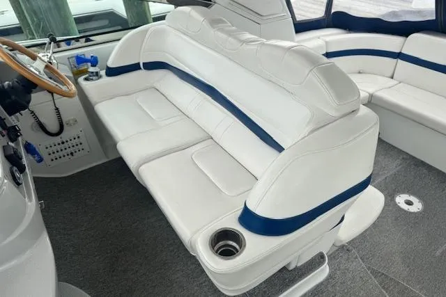 Slide: The Image of 2006 Formula 40 Performance Cruiser interior with white seating and blue accents. - 7