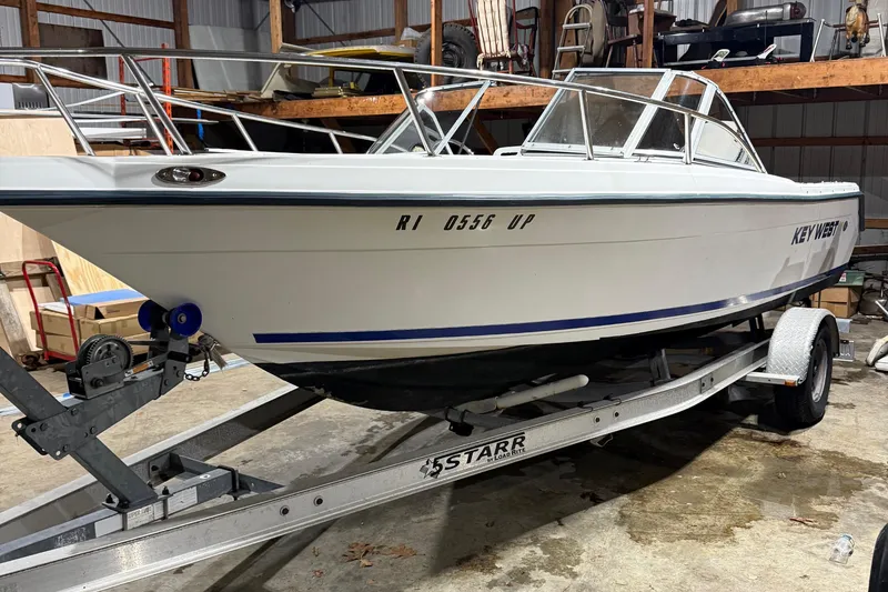 Slide: The Image of Key West 2020 Dual Console boat on trailer in storage, 2000 model year. - 8