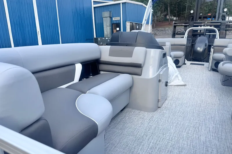 Slide: The Image of 2026 Landau ISLAND BREEZE 21 pontoon boat interior with gray seating and modern design. - 9