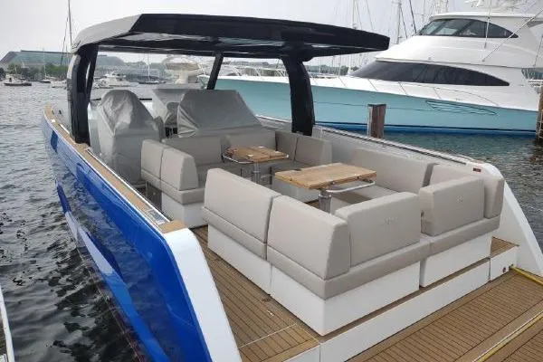 Slide: The Image of Luxurious 2023 Fjord 41 XL yacht with spacious seating and sleek design at marina. - 14