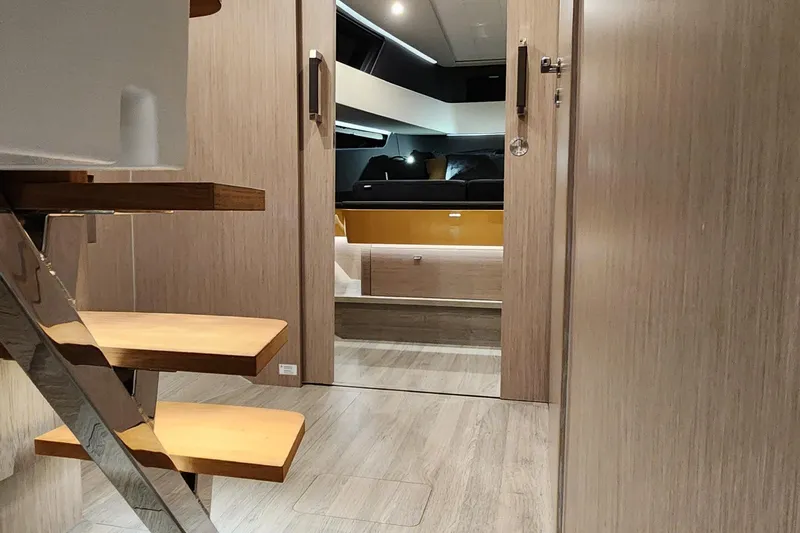Slide: The Image of Modern interior of 2023 Fjord 41 XL yacht with wooden finishes and sleek design. - 40