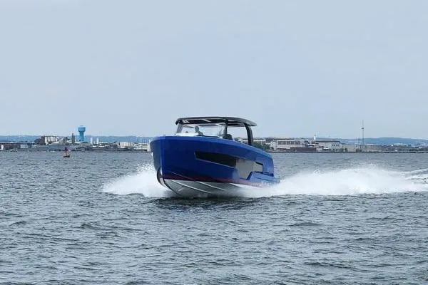 Slide: The Image of 2023 Fjord 41 XL cruising on open water, showcasing sleek design and powerful performance. - 6