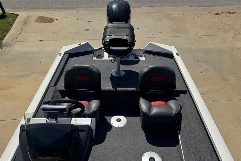 Slide: The Image of 2025 Bass Tracker Pro Team 170 dashboard with Lowrance Hook display and steering wheel. - 5