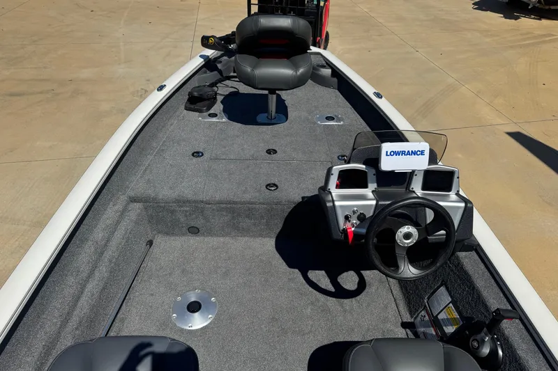 Slide: The Image of 2025 Bass Tracker Pro Team 170 boat deck with trolling motor and seating. - 7