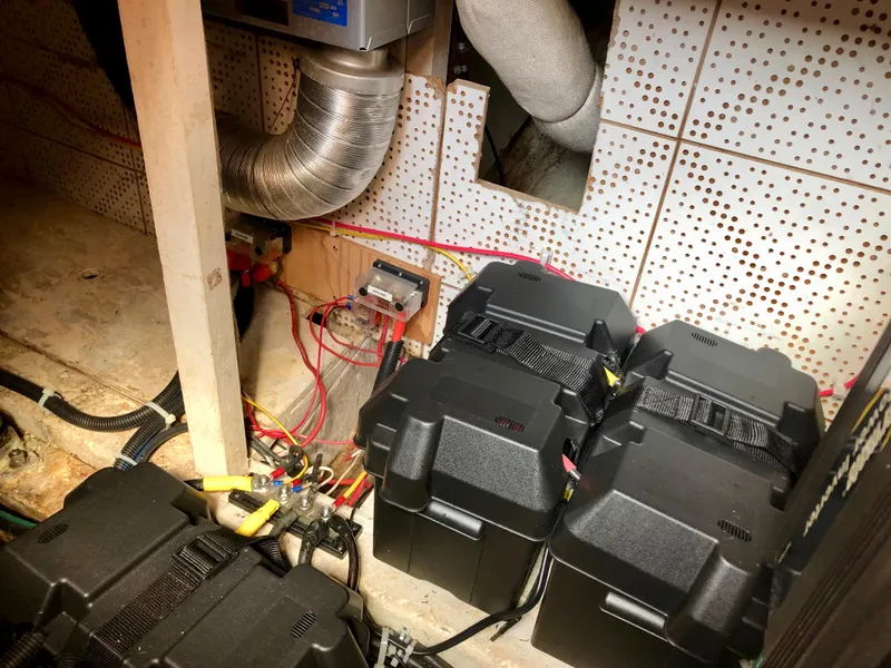 Slide: The Image of Interior of a 1978 CHB 34 boat with wooden furnishings and seating area. - 11