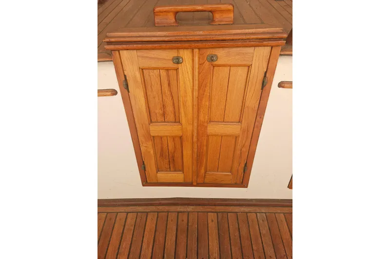 Slide: The Image of Wooden hatch door on 1978 CHB 34 boat deck. - 19