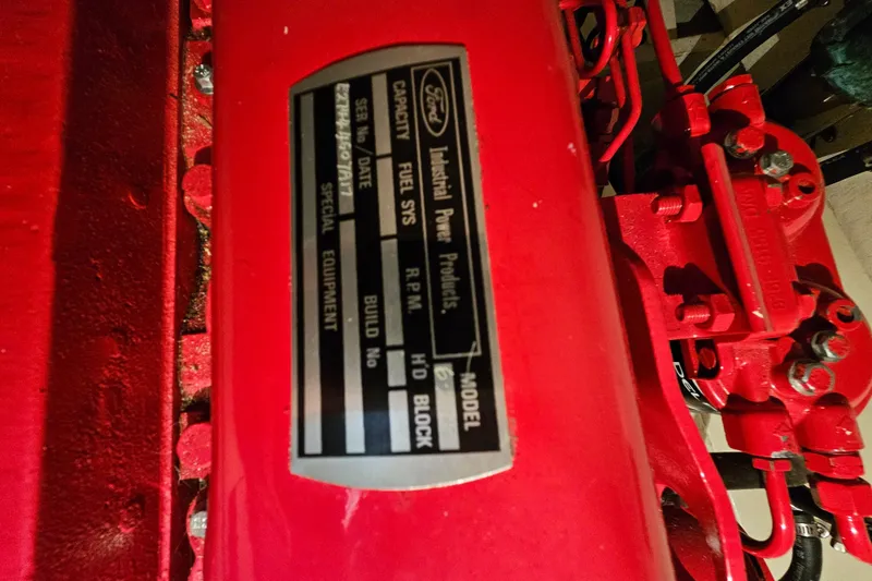 Slide: The Image of Red engine with Ford Industrial Power Products label, CHB 34 model, 1978. - 28