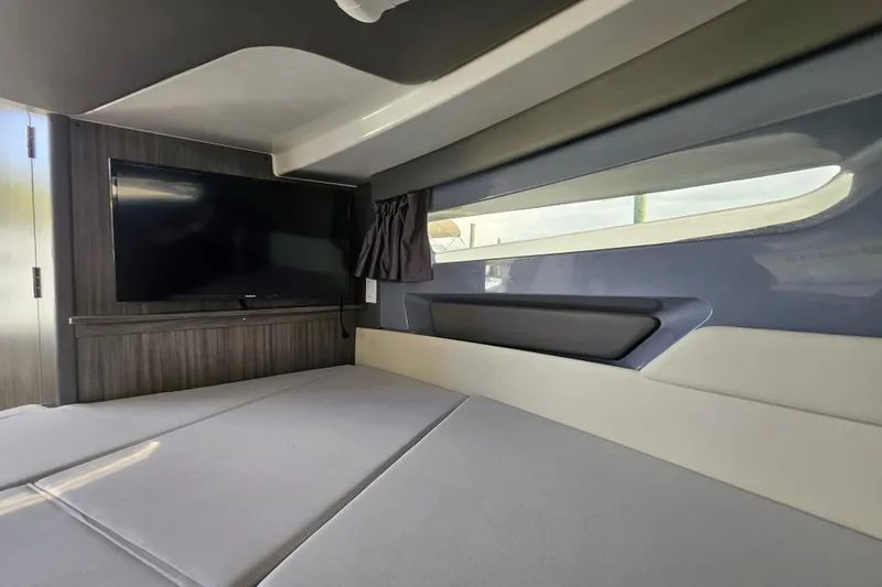 Slide: The Image of Interior cabin of 2025 Navan S30 boat, featuring modern design and comfortable seating. - 2