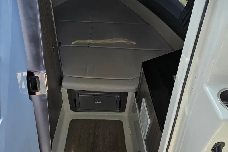 Slide: The Image of 2025 Navan S30 boat deck with cushioned seating and elegant design. - 4