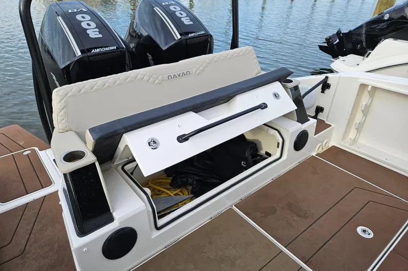 Slide: The Image of 2025 Navan S30 boat dashboard with steering wheel, controls, and digital displays. - 9