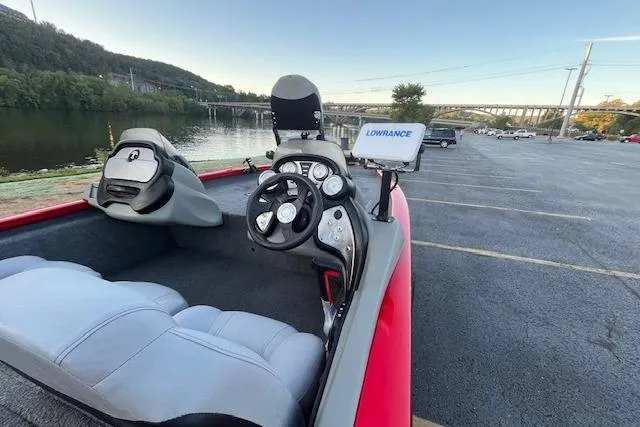 Slide: The Image of 2016 Tracker Pro Team 175 TXW boat interior with steering wheel and Lowrance system. - 10