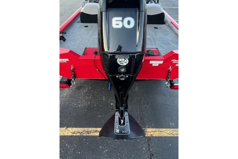 Slide: The Image of 2016 Tracker Pro Team 175 TXW boat with Mercury 60 engine, parked near a waterfront. - 9