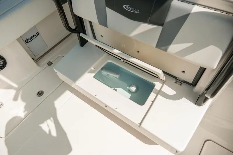 Slide: The Image of 2023 Robalo R270 Center Console boat interior storage compartment detail. - 12