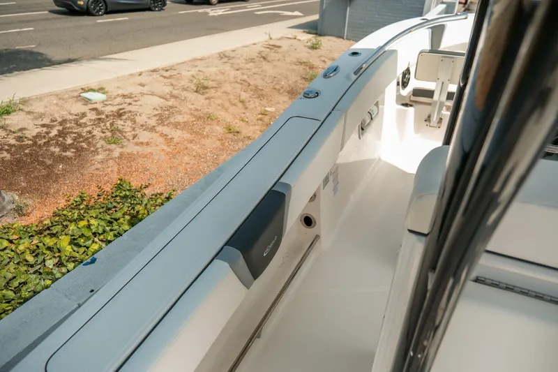 Slide: The Image of 2023 Robalo R270 Center Console boat interior, showcasing sleek design and modern features. - 13