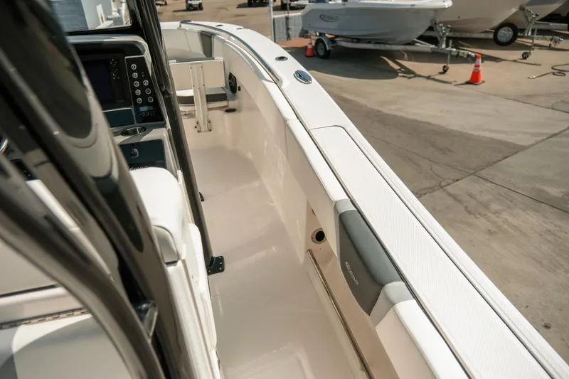 Slide: The Image of 2023 Robalo R270 Center Console boat interior with sleek design and modern features. - 14