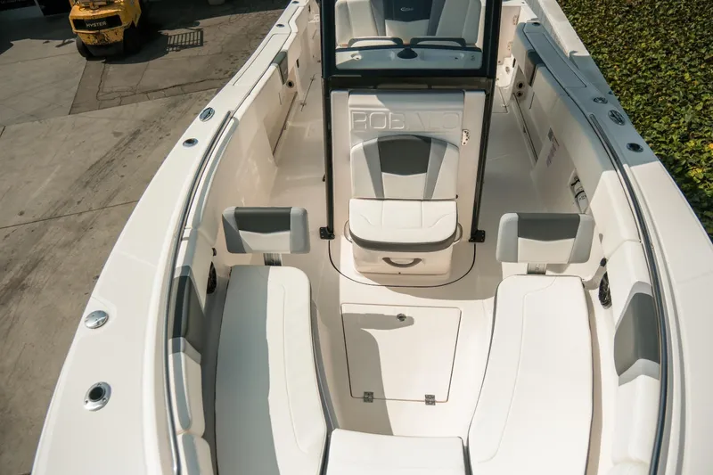 Slide: The Image of 2023 Robalo R270 Center Console boat interior with seating and console view. - 20