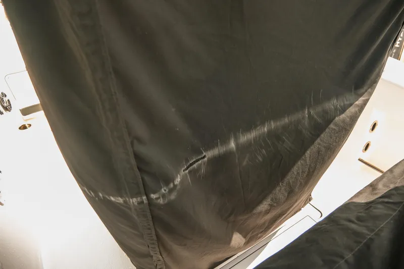 Slide: The Image of 2023 Robalo R270 Center Console with protective black cover. - 38