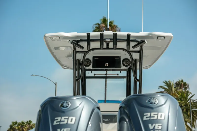 Slide: The Image of 2023 Robalo R270 Center Console boat with dual Yamaha 250 V6 engines. - 7