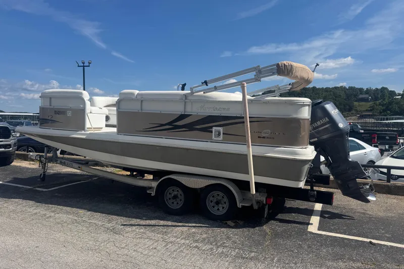 Slide: The Image of 2013 Hurricane Fundeck 216 boat on trailer with Yamaha outboard motor. - 1