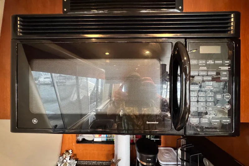 Slide: The Image of GE Spacemaker microwave in 2006 Meridian 490 Pilothouse kitchen. - 18