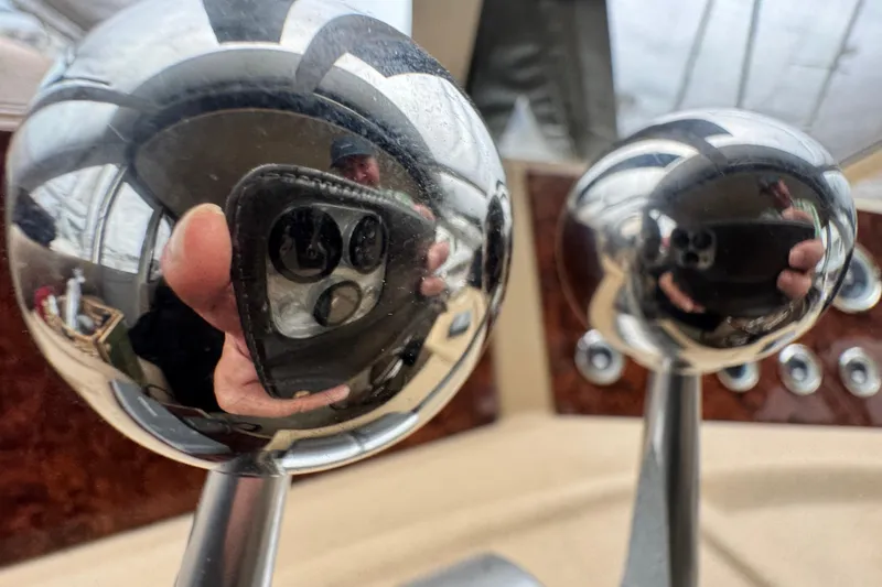 Slide: The Image of Close-up of reflective controls on a 2006 Meridian 490 Pilothouse yacht. - 21