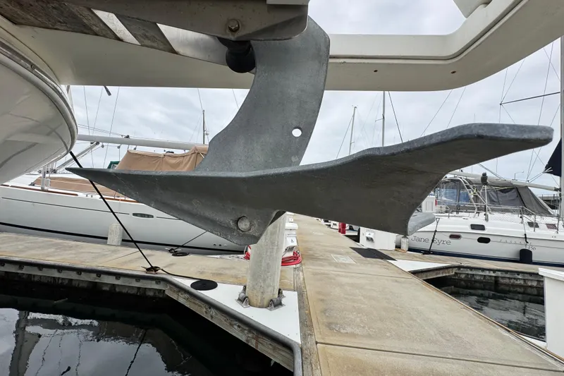 Slide: The Image of Anchor of 2006 Meridian 490 Pilothouse yacht at marina dock. - 23