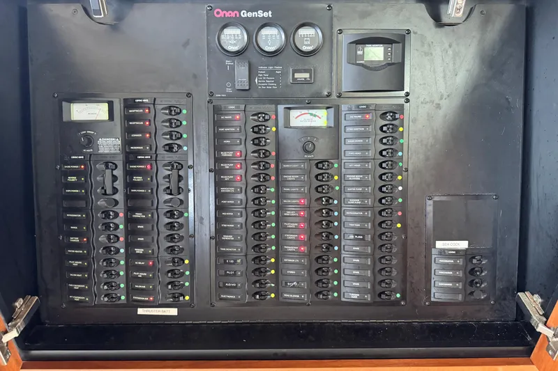 Slide: The Image of Electrical control panel of a 2006 Meridian 490 Pilothouse boat. - 34