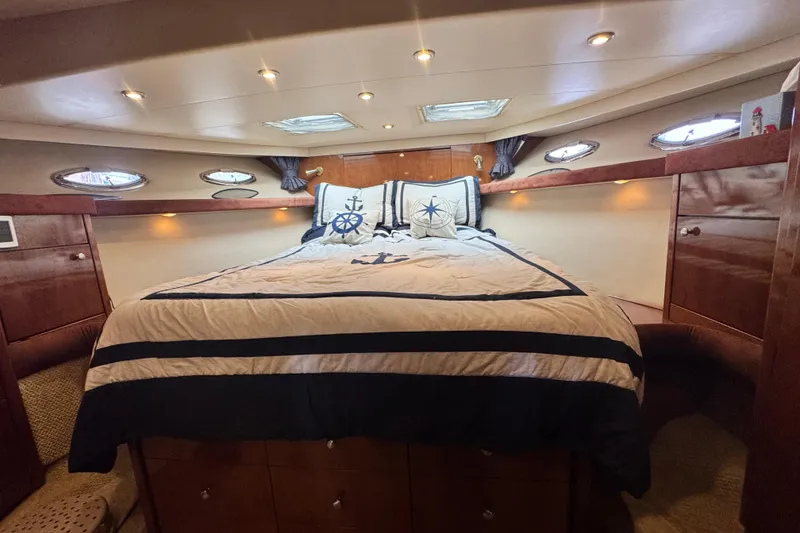 Slide: The Image of Luxurious cabin interior of 2006 Meridian 490 Pilothouse yacht with nautical decor. - 9
