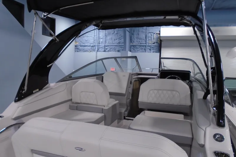 Slide: The Image of 2026 Regal 26 XO boat interior with luxurious seating and sleek design. - 7