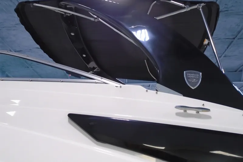 Slide: The Image of 2026 Regal 26 XO boat with sleek design and modern features. - 9