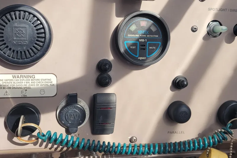 Slide: The Image of Control panel of a 2005 Regal Commodore 3560 IO boat with warning labels and gauges. - 25