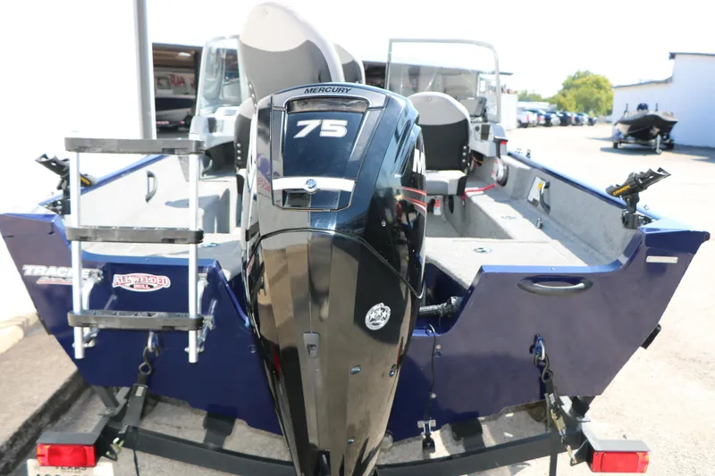 Slide: The Image of 2019 Tracker Pro Guide V-16 WT boat with Mercury 75 engine, rear view. - 11