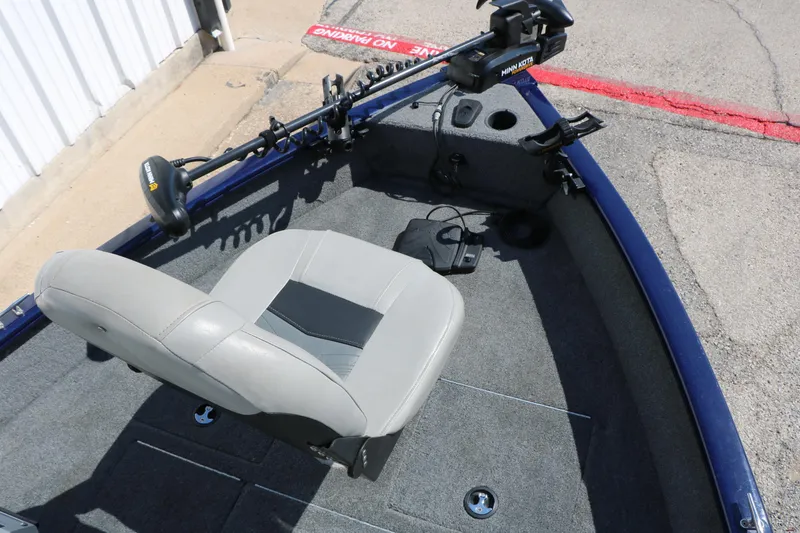 Slide: The Image of 2019 Tracker Pro Guide V-16 WT boat interior with seat and trolling motor. - 31