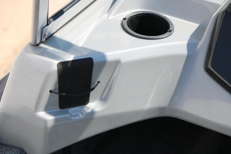 Slide: The Image of 2019 Tracker Pro Guide V-16 WT boat detail with cup holder and black panel. - 39