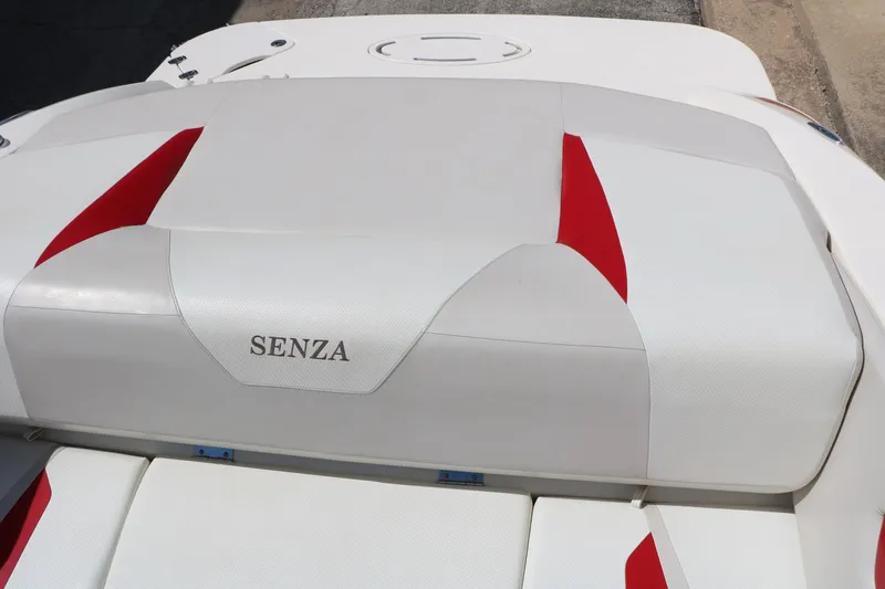 Slide: The Image of 2006 Larson 206 Senza boat interior with white and red upholstery. - 19