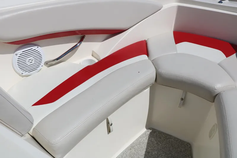 Slide: The Image of Interior seating of 2006 Larson 206 Senza boat with red and white upholstery. - 28