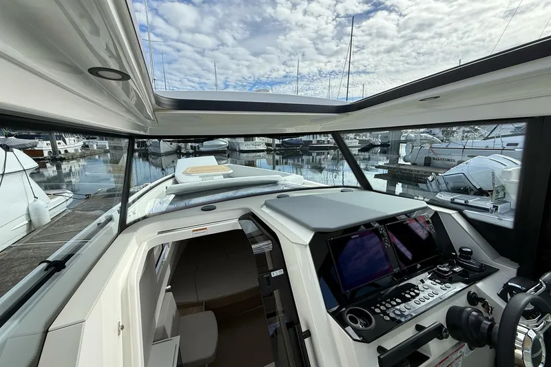 Slide: The Image of Interior of 2026 Saxdor 340 GTWA boat with modern seating and table. - 15