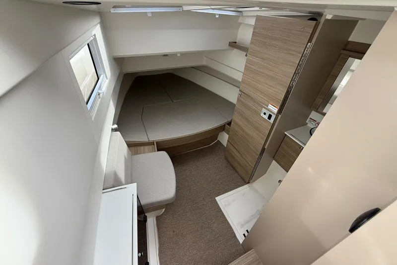 Slide: The Image of Interior view of 2026 Saxdor 340 GTWA yacht with modern cockpit and marina backdrop. - 16