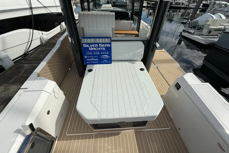 Slide: The Image of 2026 Saxdor 340 GTWA yacht interior with seating and kitchenette, for sale by Silver Seas Yachts. - 9