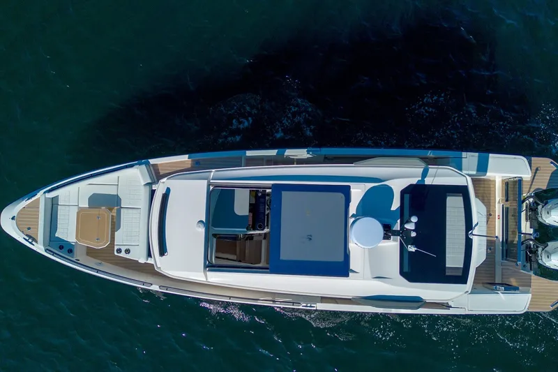 Slide: The Image of Aerial view of 2026 Saxdor 340 GTWA boat cruising on water. - 5