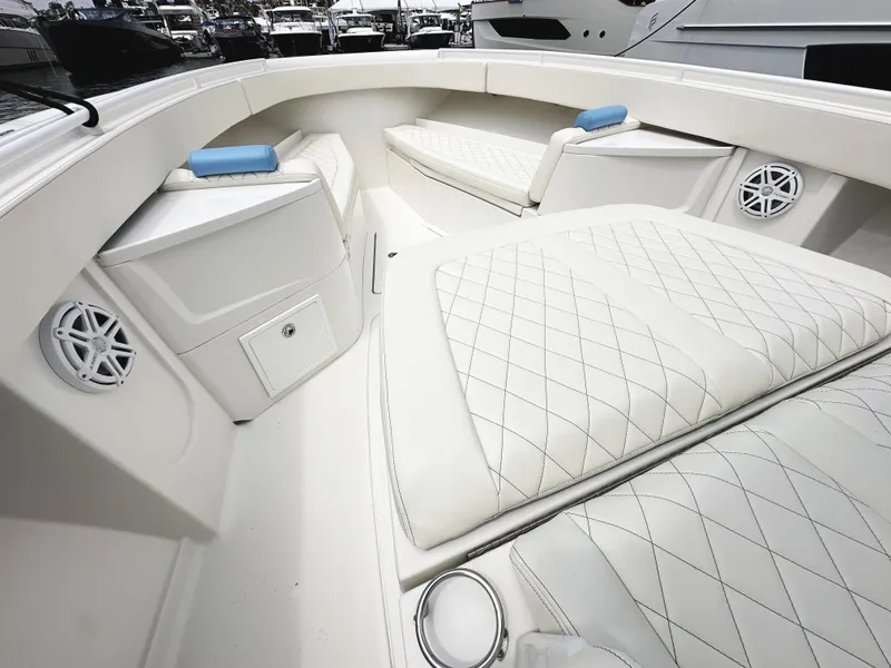 Slide: The Image of Luxurious interior of 2018 HCB 39 Speciale boat with white quilted seating. - 33