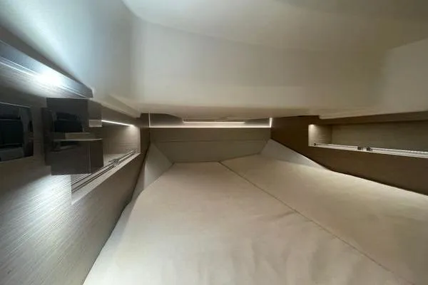 Slide: The Image of 2023 Fjord 38 Xpress cabin interior with modern lighting and sleek design. - 12