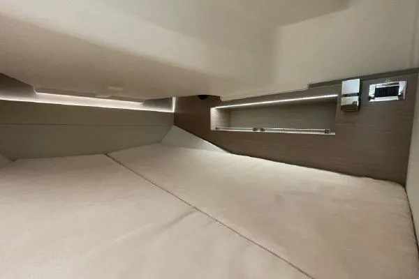 Slide: The Image of 2023 Fjord 38 Xpress cabin interior with modern lighting and sleek design. - 13