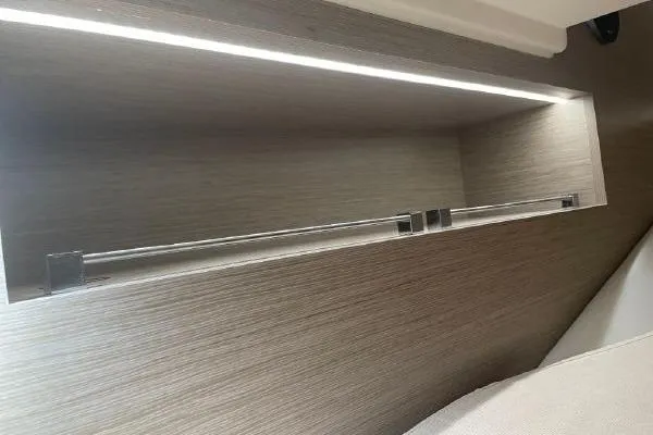 Slide: The Image of 2023 Fjord 38 Xpress interior shelf with modern lighting and sleek design. - 15
